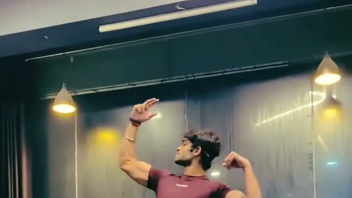 Alok training on the gym floor